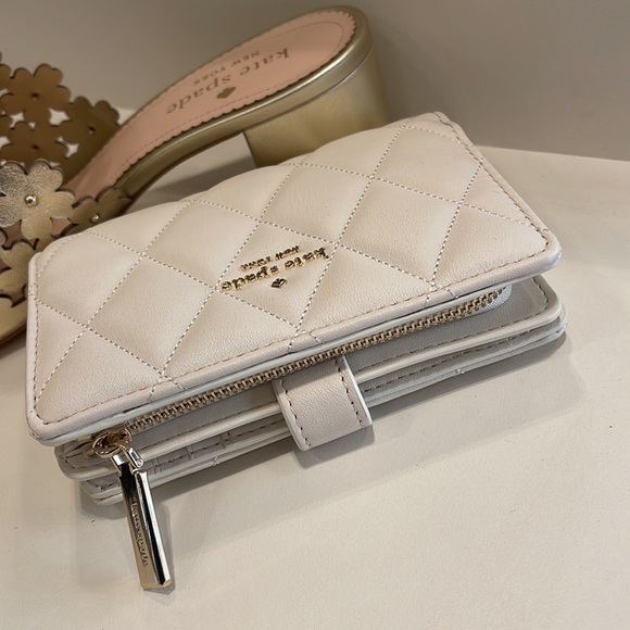 Kate Spade Carey Medium Compartment Bifold Wallet 
COLOR: Parchment - Picture 12 of 16